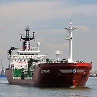 Gas tanker sailing into dock of the Antwerp harbour, Belgium